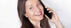 快乐微笑女人调用智能手机肖像白色背景人技术沟通概念
