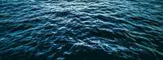 深蓝色的海洋水纹理黑暗海波背景自然环境设计