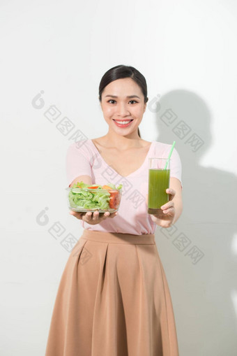 女人绿色排毒冰沙沙拉玻璃碗孤立的白色背景适当的<strong>营养素</strong>食者食物健康的生活方式节食概念区域复制空间