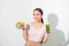 女人绿色排毒冰沙沙拉玻璃碗孤立的白色背景适当的营养素食者食物健康的生活方式节食概念区域复制空间