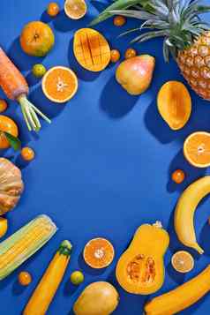 集合新鲜的黄色的水果蔬菜蓝色的背景