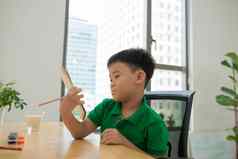 亚洲学生男孩研究家庭作业首页表格首页教育思考行动