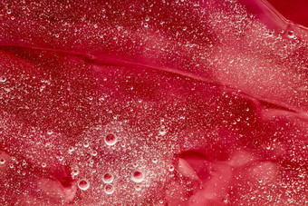 摘要红色的液体背景油漆飞溅漩涡模式水滴美过来这里<strong>化妆品</strong>纹理当代魔法艺术科学奢侈品平铺设计