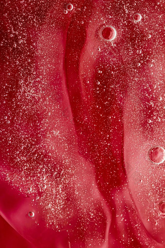 摘要红色的液体背景油漆飞溅漩涡模式水滴美过来这里化妆品纹理当代魔法艺术科学奢侈品平铺设计