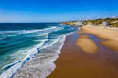沙滩上大葡萄牙美丽的日落葡萄牙语海滩沙滩上大葡萄牙海滩沙滩上大视图大西洋海滩大波了可乐辛特拉葡萄牙