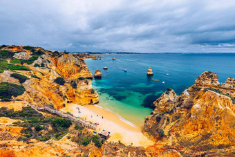 卡米洛海滩沙滩上卡米洛拉各斯阿尔加夫葡萄牙木人行桥海滩沙滩上卡米洛葡萄牙风景如画的视图沙滩上卡米洛海滩拉各斯阿尔加夫地区葡萄牙
