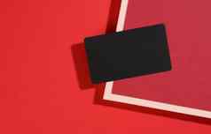 空白黑色的矩形业务卡谎言现代红色的背景红色的表纸影子业务模板