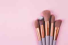 集合集团化妆刷大小孤立的粉红色的背景集化妆艺术家人减少对象美女