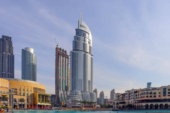 迪拜阿联酋12月天际线体系结构城市景观迪拜现代城市天际线全景日落视图阿联酋城市城市景观