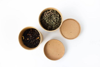 绿色黑色的茶可重用的轮纸板包装孤立的白色背景视图