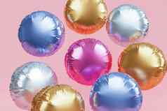 闪亮的色彩斑斓的气球粉红色的背景聚会，派对生日庆祝活动假期现实的渲染