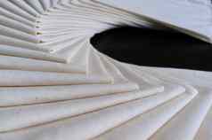 白色织物折叠堆放织物纹理背景概念车间
