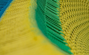 编织色彩斑斓的绳子软灵活的绳子美丽的棉花绳子编织有序的的方式浅深度场