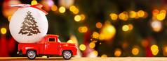 横幅照片红色的小复古的玩具卡车白色圣诞节球