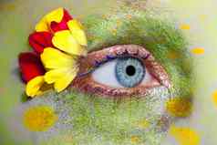 蓝色的女人眼睛化妆春天花比喻