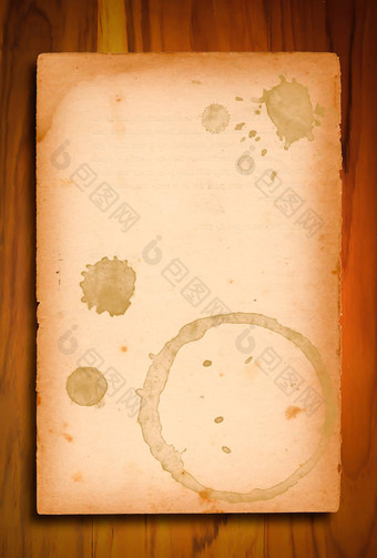 古董纸咖啡污渍木背景