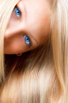 金发碧眼的头发金发女郎女孩蓝色的眼睛