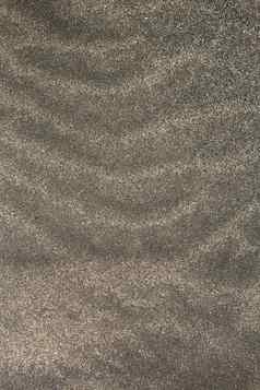 金丝雀岛屿棕色（的）海滩沙子纹理