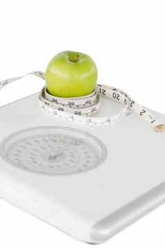 绿色苹果环绕磁带测量weigh-scale