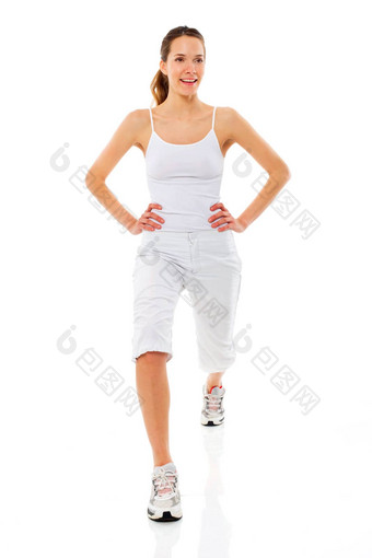 年轻的女人体操白色背景工作室