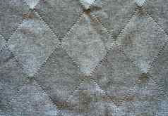 针织羊毛模式菱形形式灰色背景