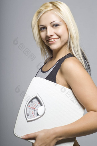 微笑减肥年轻的女人快乐目标饮食重量