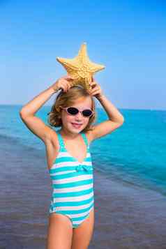 孩子孩子女孩夏天海滩假期海星