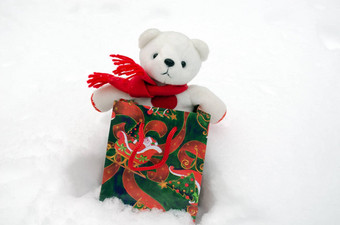 豪华的泰迪熊圣诞节礼物现在袋雪