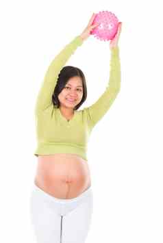 亚洲怀孕了女人锻炼瑜伽球