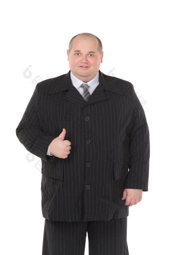 优雅的脂肪男人。黑色的西装显示翘拇指