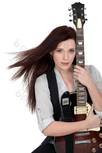 女人拥抱吉他