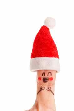 手指穿着圣诞老人的红白帽子