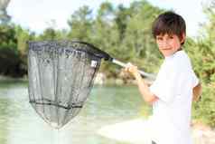 年轻的男孩大钓鱼网