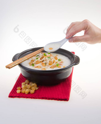 传统的中国人扇贝粥大米粥服务claypo