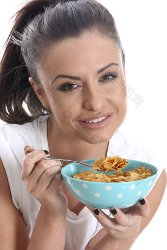 模型<strong>发布</strong>年轻的女人吃碗早餐麦片
