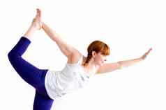 中间岁的女人锻炼瑜伽