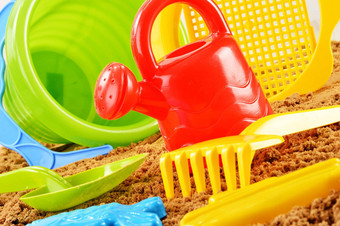 塑料孩子们玩具玩沙坑海滩