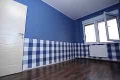 空房间蓝色的墙蓝白色壁纸