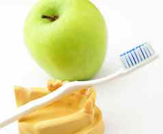 牙科健康护理概念绿色苹果牙刷