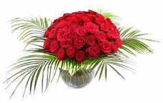 大花束红色的玫瑰透明的玻璃花瓶孤立的图像白色背景
