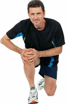 成人有吸引力的男人。运动服装膝盖疼痛受伤疼痛孤立的