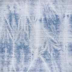 漂白蓝色的珍织物纹理背景