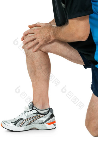 成人有吸引力的男人。运动服装膝盖疼痛受伤疼痛孤立的