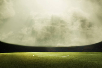 数字合成的足球场多云的天空
