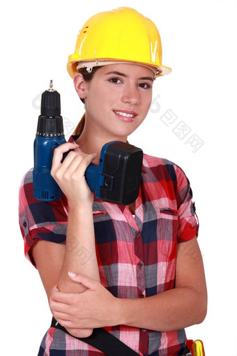 tradeswoman持有电池<strong>供电</strong>的权力工具