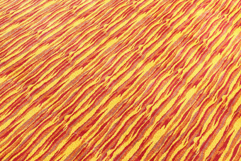 黄色的红色的地毯纹理