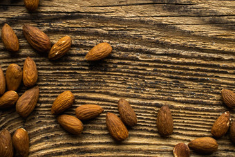 杏仁分散木古董表格复制空间杏仁健康的素食者蛋白质有营养的食物杏仁乡村木