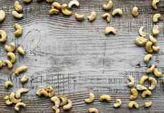 腰果坚果分散木古董表格腰果螺母健康的素食者蛋白质有营养的食物