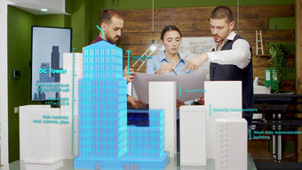 团队架构师工作城市摩天大楼增强现实全息图