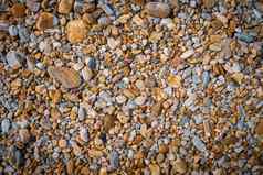 小岩石海滩棕色（的）颜色语气背景纹理